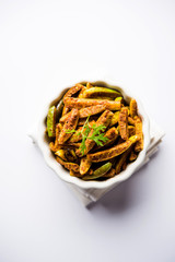 Tindora Sabzi / Tendli / tondli Fry also known as Ivy Gourd fry recipe. selective focus