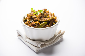 Tindora Sabzi / Tendli / tondli Fry also known as Ivy Gourd fry recipe. selective focus