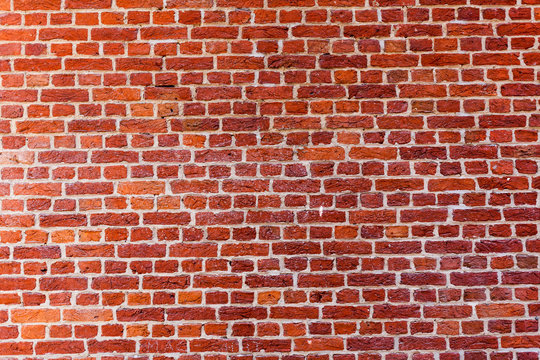 Old red brick wall background texture close up. bricked wall textured pattern for continuous replicate.