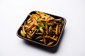 Tindora Sabzi / Tendli / tondli Fry also known as Ivy Gourd fry recipe. selective focus