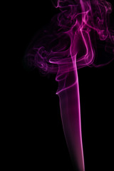 Purple smoke on black background