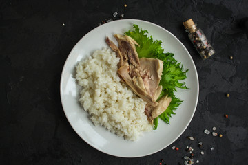 rice and boiled chicken meat. proper nutrition. food background. copy space