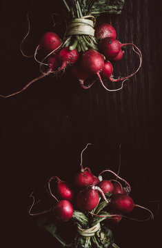 Overhead view of radishes on wooden table