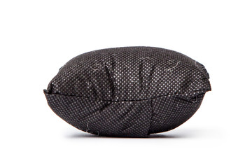 Black pillow isolated on white