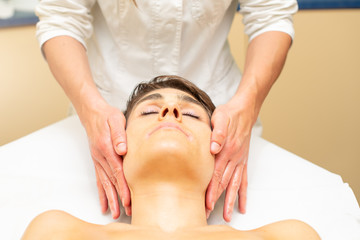 Fototapeta na wymiar Aesthetic study. Beautician practice facial massage
