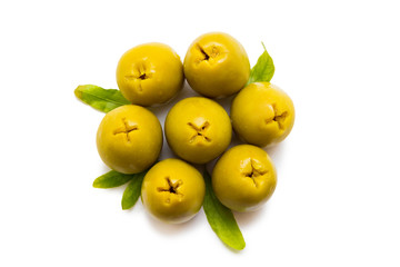 Green olives isolated on white