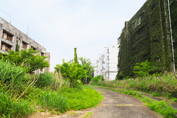 Fototapeta na wymiar Ruined apartment buildings in Ikeshima, Nagasaki, Japan
