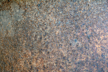 the background of rusty iron plate with rough surface with  light