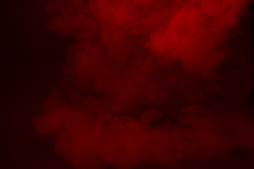 Colorful smoke close-up on a black background