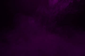 Colorful smoke close-up on a black background