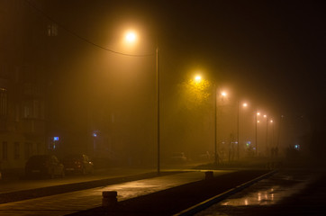 Evening street in the fog