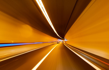 Road in an underground tunnel. Shooted with motion blur.