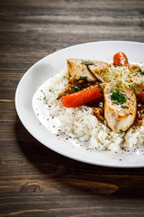 Chicken meat with rice and vegetables