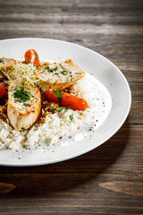 Chicken meat with rice and vegetables