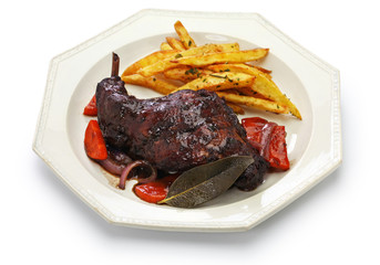 rabbit cooked in red wine with french fries