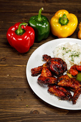 Roasted chicken wings white rice and vegetables
