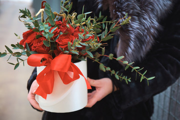 .A bouquet of red roses in a white box