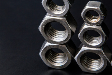 Metal hardware on a black background