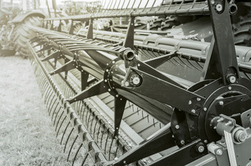 Fototapeta premium Grain harvester machine. Tractor that harvest soy grains. Close up. 
