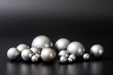 Metal hardware on a black background