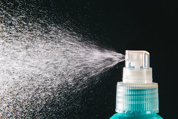 Spraying the aerosol from the spray