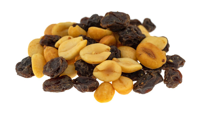 Portion Of Peanuts And Raisins Isolated On A White Background.