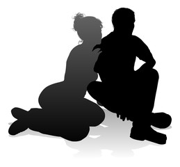 People silhouette of a young man and woman, probably a couple or husband and wife