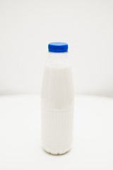 milk bottle on white table