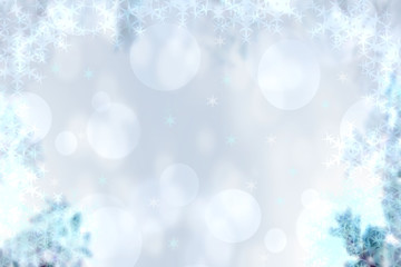 Abstract blurred festive winter christmas or Happy New Year background with shiny blue and white bokeh lighted stars. Space for your design. Card concept.