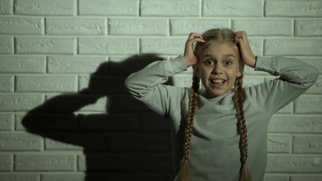 Little girl loudly screaming, kidnaping victim afraid of criminals, violence