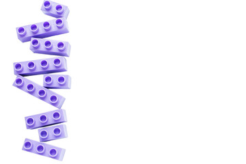 Children's purple brick on a white background. Copy space. The concept of childhood, hobbies, backgrounds.