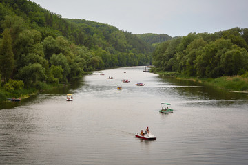 Boats on the Seversky Donets river, Holy Mountains and Sviatogorskaya Lavra at Sviatogorsk.