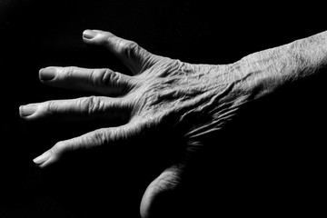 close up of senior woman hand