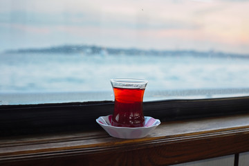 Traditional Turkish tea in Istanbul at the shores of the Bosphorus