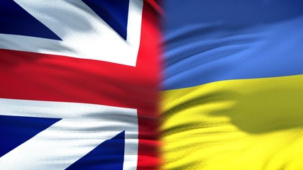 Great Britain and Ukraine flags background, diplomatic and economic relations