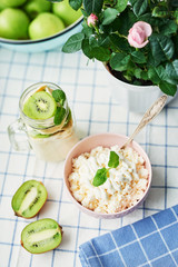 Kiwi yogurt, green apples, cottage cheese with sour cream and mint,vegetarian desserts. Healthy breakfast. Good morning. Healthy vegan food. Vegetarian desserts, concept varieties desserts