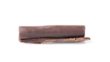 Yummy chocolate curl for decor on white background