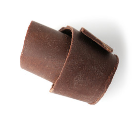 Yummy chocolate curl for decor on white background