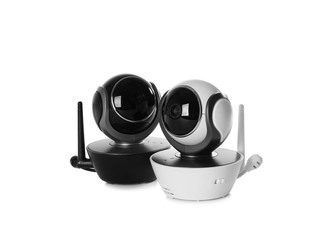 Modern CCTV security cameras on white background