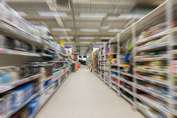 interior hypermarket in the Department of household appliances, Abstract blur Background,  Convenience Store as shopping Concept. - obrazy, fototapety, plakaty