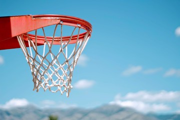 basketball hoop on background of blue sky