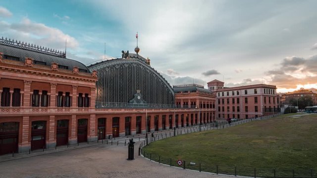 Madrid Puerta de Atocha Railway station in timelapse. Sunset time of day