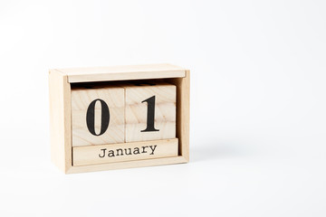 Wooden calendar January 01 on a white background