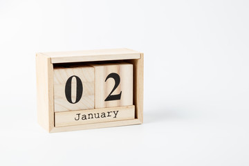 Wooden calendar January 02 on a white background