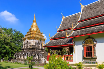 Chapel and golden pagoda at Wat Chiang Man in Chiang Mai, North of Thailand