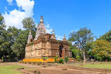 Fototapeta premium Ancient pagoda at Wat Photharam Maha Wihan (Chet Yot) Chiang Man in Chiang Mai, North of Thailand