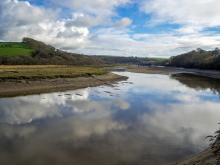 beautiful cloud reflections in the River Torridge at Bideford in Devon