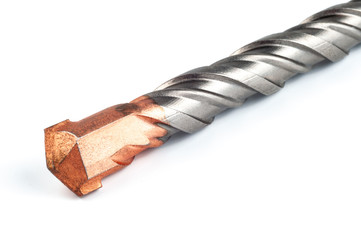 Masonry bit for the hammer drill, close-up, on a white background