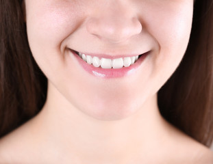 Obraz premium Young woman with beautiful smile, closeup view