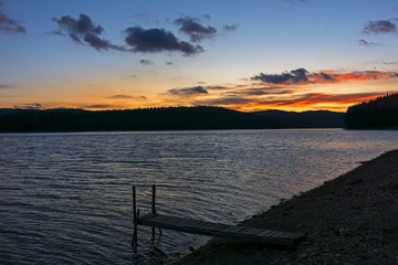 sunset over mountain lake